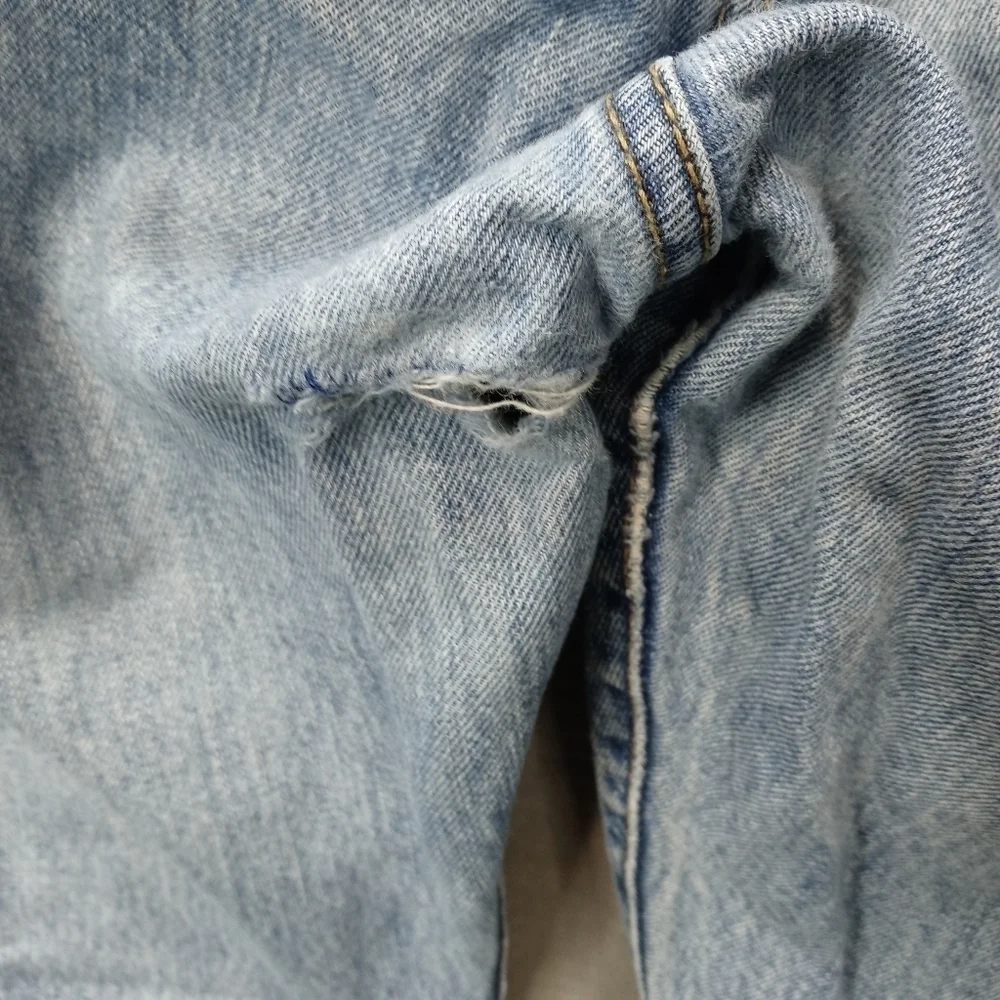 Levis 501XX men's button fly blue jeans. Sz 38x34.tear in seat. See last pic. M2